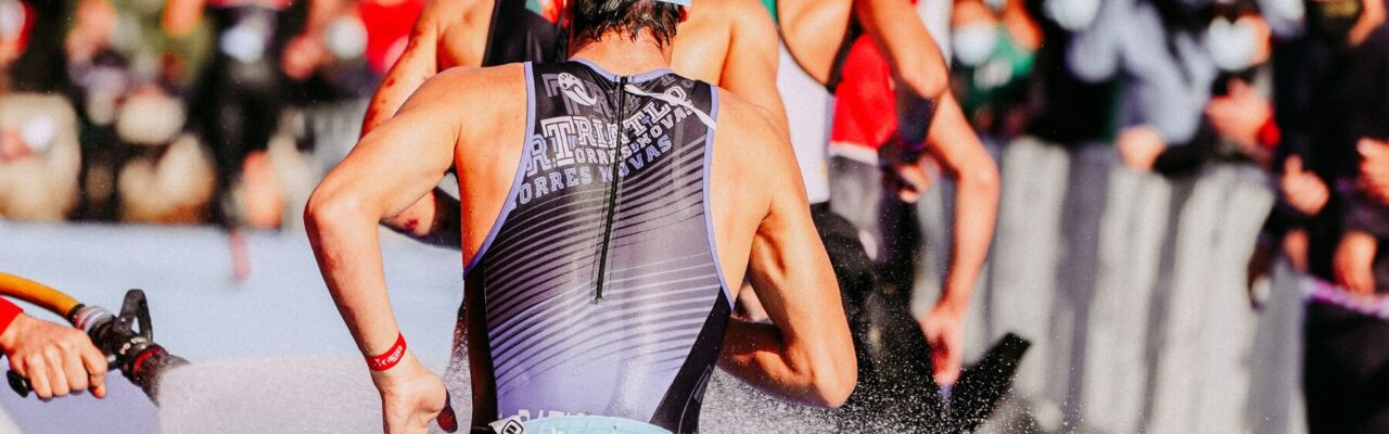 athlete completing the swim section of a triathlon